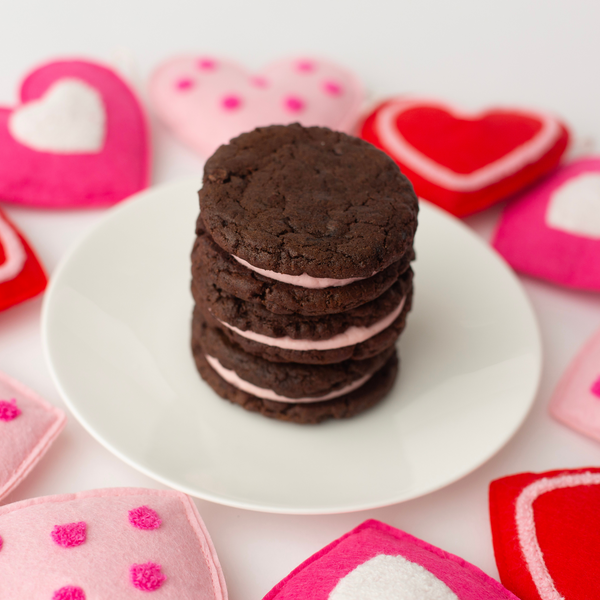 Chocolate Cookies with strawberry buttercream in between