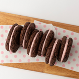 Chocolate Cookies with strawberry buttercream in between